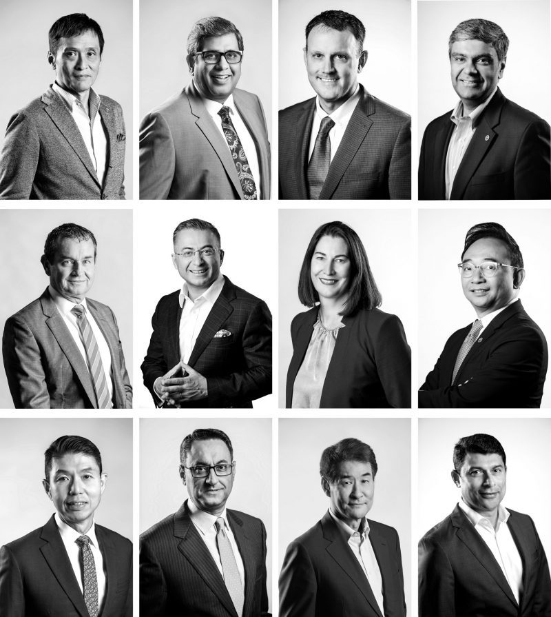 Monochrome black and white studio portrait photography for corporate headshots. Professional location studio portraiture taken during a Asian Pacific and Japan Leaders' conference in Singapore